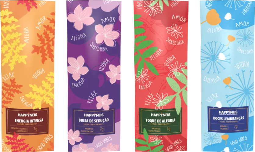 Four colorful sachet packages with floral designs labeled Happyness with scents Energia Intensa, Brisa de Sedução, Toque de Alegria, and Doces Lembranças.